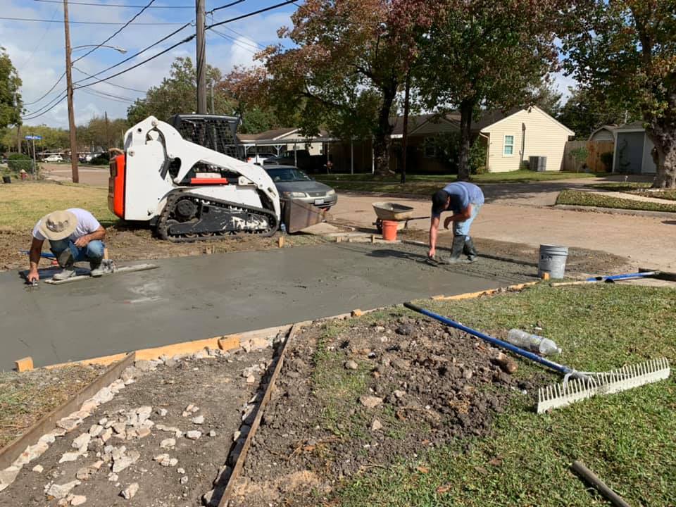 Two Men Create Concrete Driveways